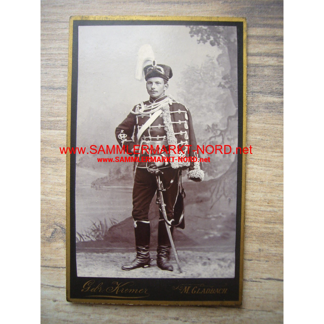 Cabinet photo - hussar with fur hat & saber