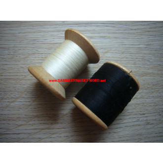 2 x thread spool (white & black) for uniforms