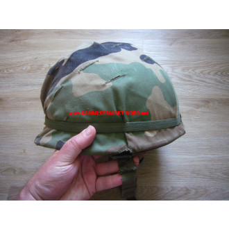 USA steel helmet M1 with inner helmet and camouflage cover