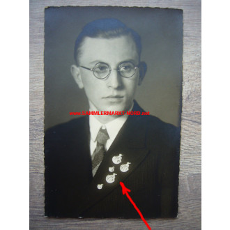 Man with various badges of the Albertus University Königsberg 1938