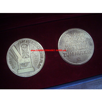 DDR - Medals in a case - 25 years citizens' initiative - NAW reconstruction work